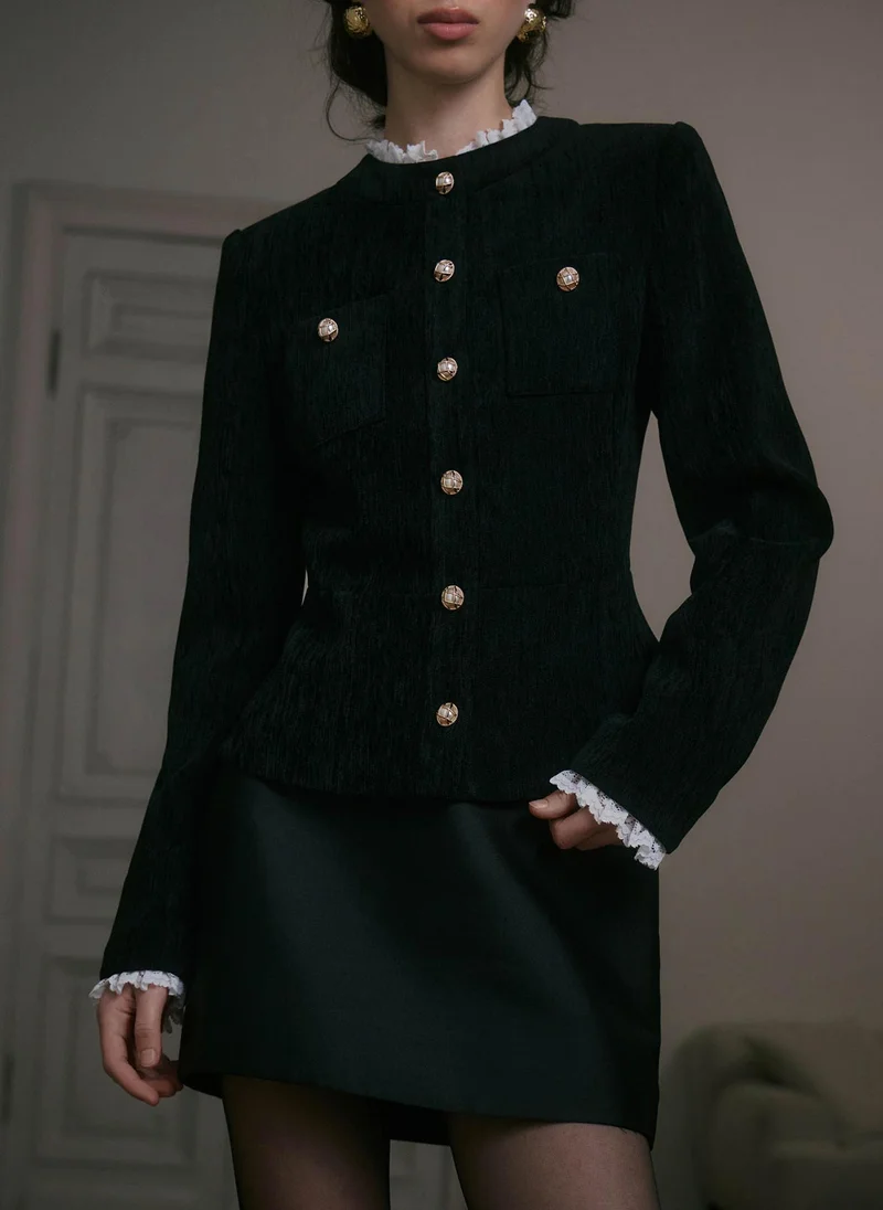 ليتشي جاكيت من جلد الغزال بتفاصيل متباينة